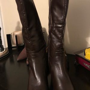 Knee length boots by Madeline.